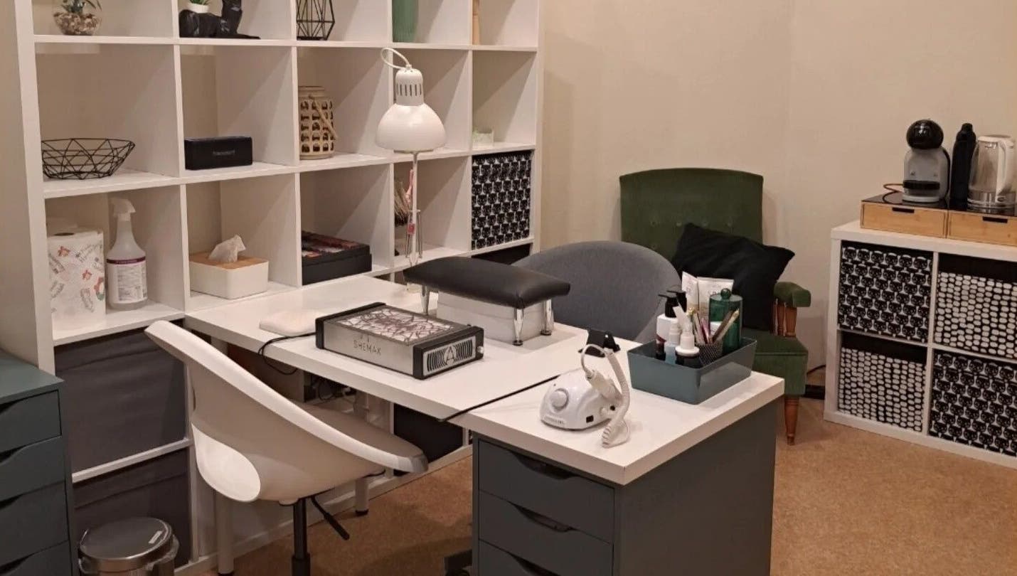 Cozy workspace at Nails & Pearls Manikīra studija, Rīga, LV featuring a stylish nail setup.