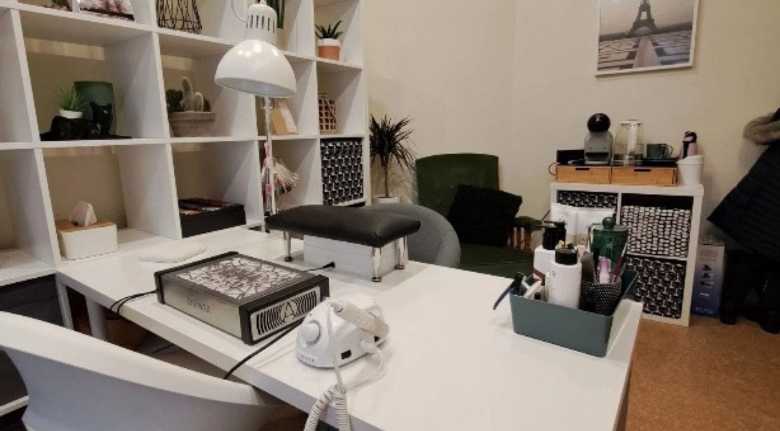 Modern nail station at Nails & Pearls Manikīra studija in Rīga, LV with nail tools and decor accents.