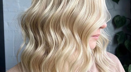 Blonde waves styled at Peppers Hair and Beauty in Scone, New South Wales, AU, showcasing vibrant and healthy hair.