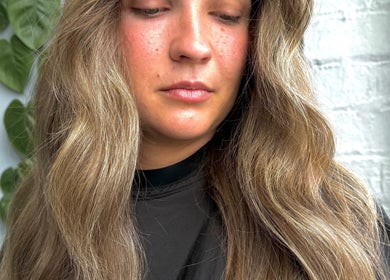 Close-up of a woman with flowing hair at Peppers Hair and Beauty, Scone, New South Wales, AU.