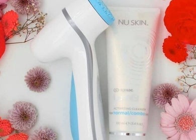 Beauty device and skincare product with flowers at Bronzed Beauty, Bournemouth, England, GB.