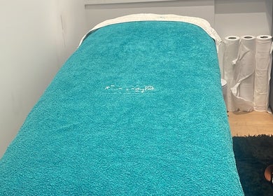 Relaxing spa bed at Bronzed Beauty in Bournemouth, England, GB for ultimate wellness experience.
