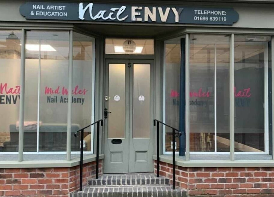 Front view of Nail Envy-Mid Wales in Newtown, Wales, GB, showcasing stylish signage and entrance.