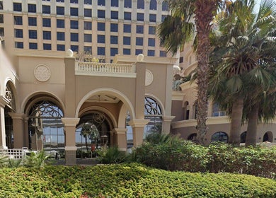 Elegant entrance of Maison De Joelle- Mirdif amidst lush greenery, located in Dubai, AE.