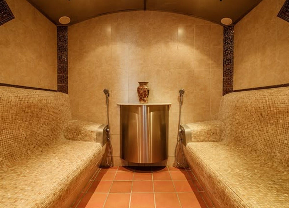Luxurious steam room at Total Concept Salon & Spa in Gqeberha, Eastern Cape, ZA. Modern relaxation and wellness ambiance.