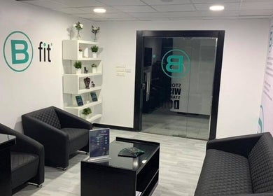 Stylish lounge at Body Fit Egypt EMS Maadi Branch in Cairo, Cairo, EG with sleek seating and decor for relaxation.