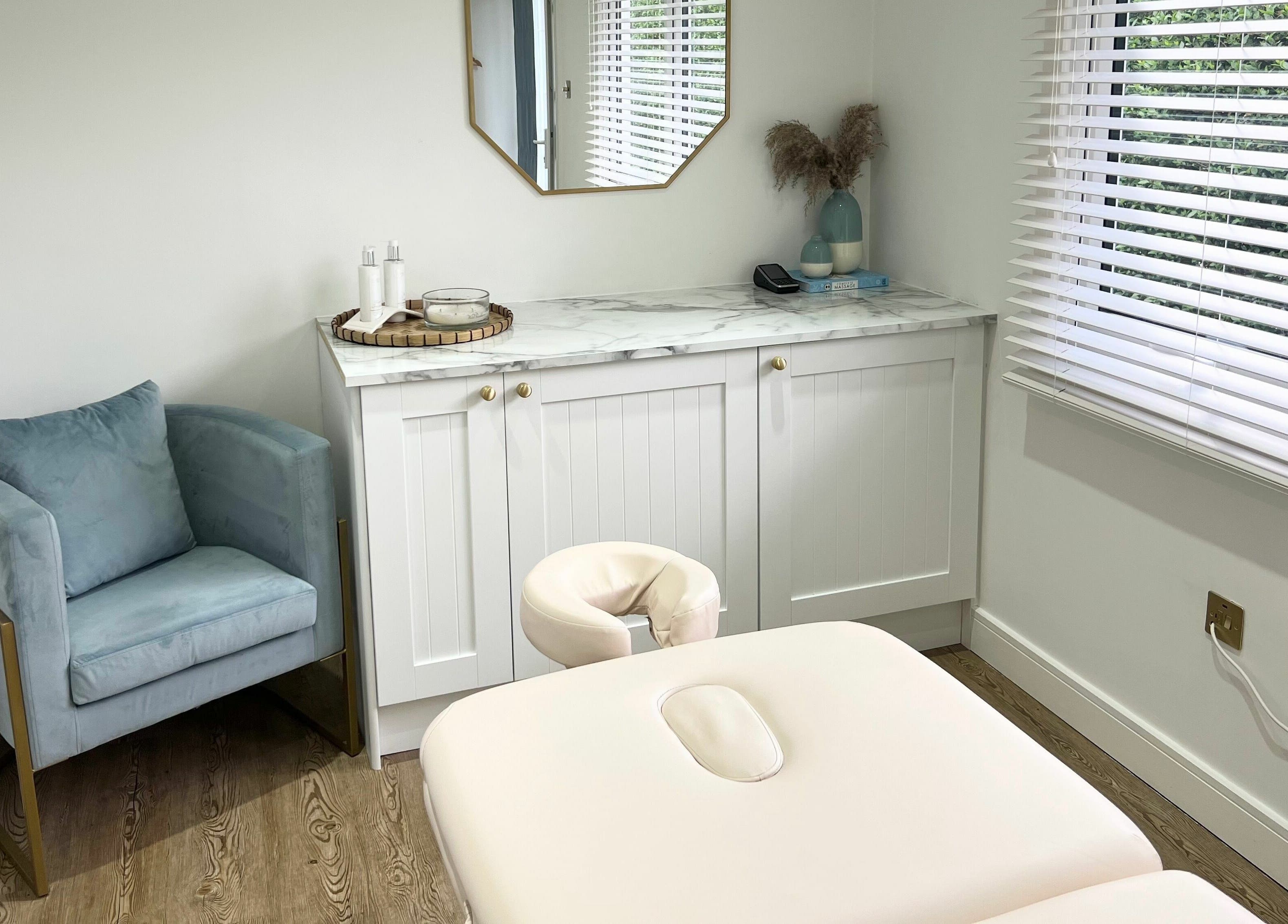 Relaxing massage room at Coleman’s Massage Therapies, Portsmouth, England, GB, featuring a comfortable chair.