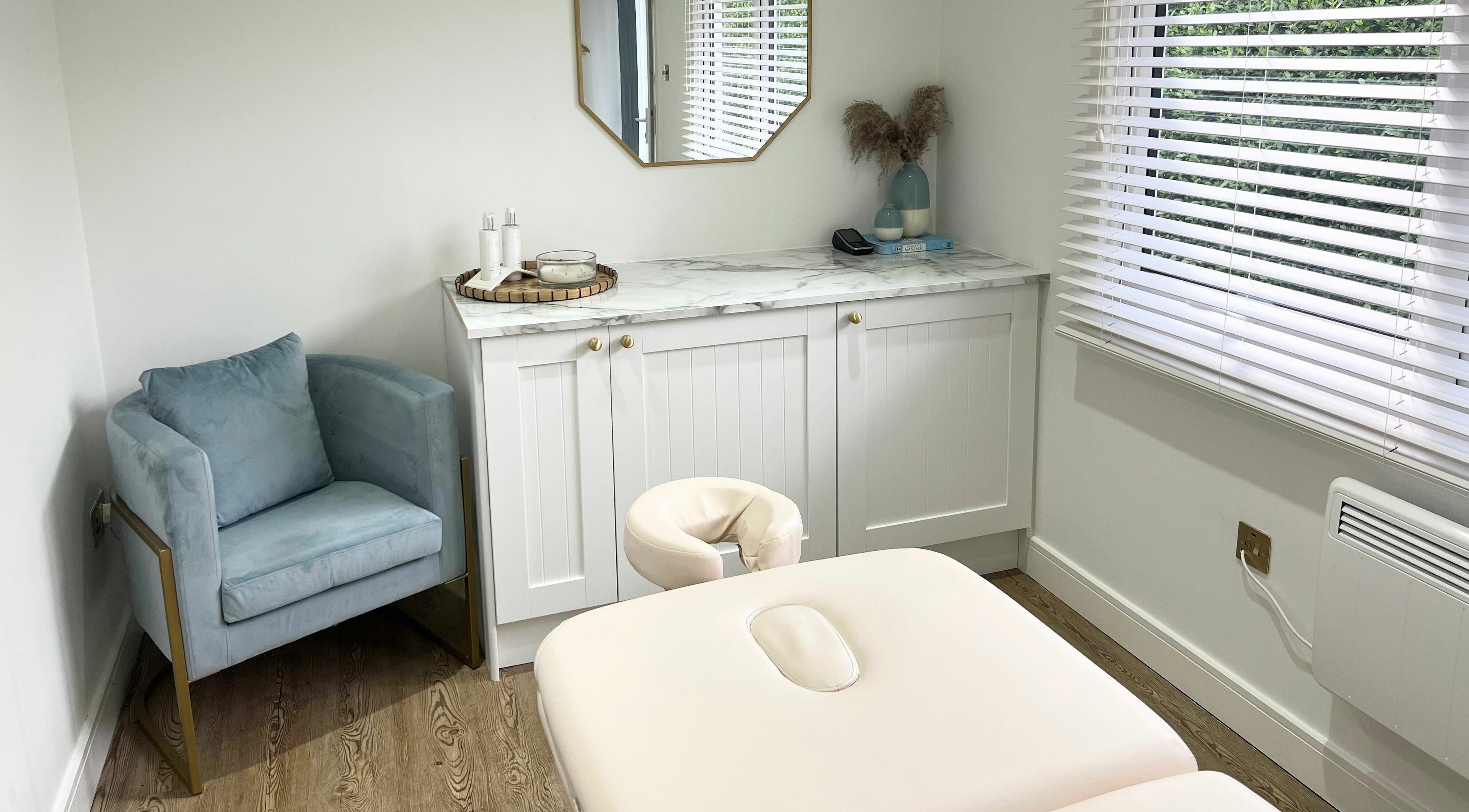 Relaxing massage room at Coleman’s Massage Therapies, Portsmouth, England, GB, featuring a comfortable chair.