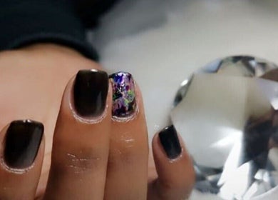 Elegant nail art with black and floral designs at Nail Craft by Crystal, Cape Town, Western Cape, ZA.