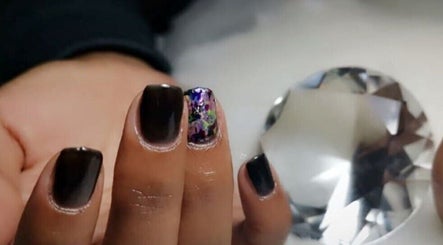 Elegant nail art with black and floral designs at Nail Craft by Crystal, Cape Town, Western Cape, ZA.