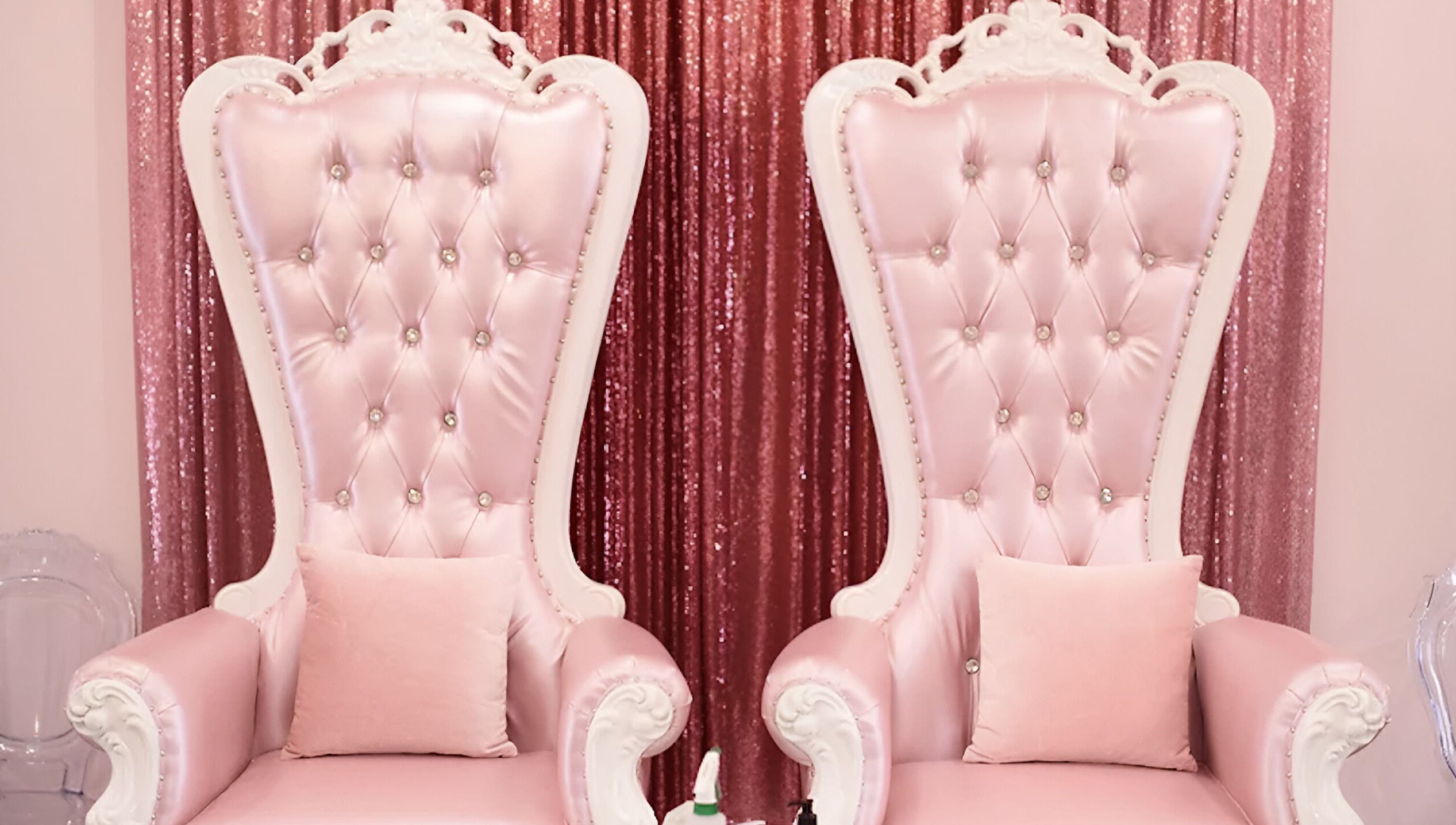 Elegant pink throne chairs at Sugar and Spice Kids Spa and Party, Hamilton, Ontario, CA, perfect for glamorous events.