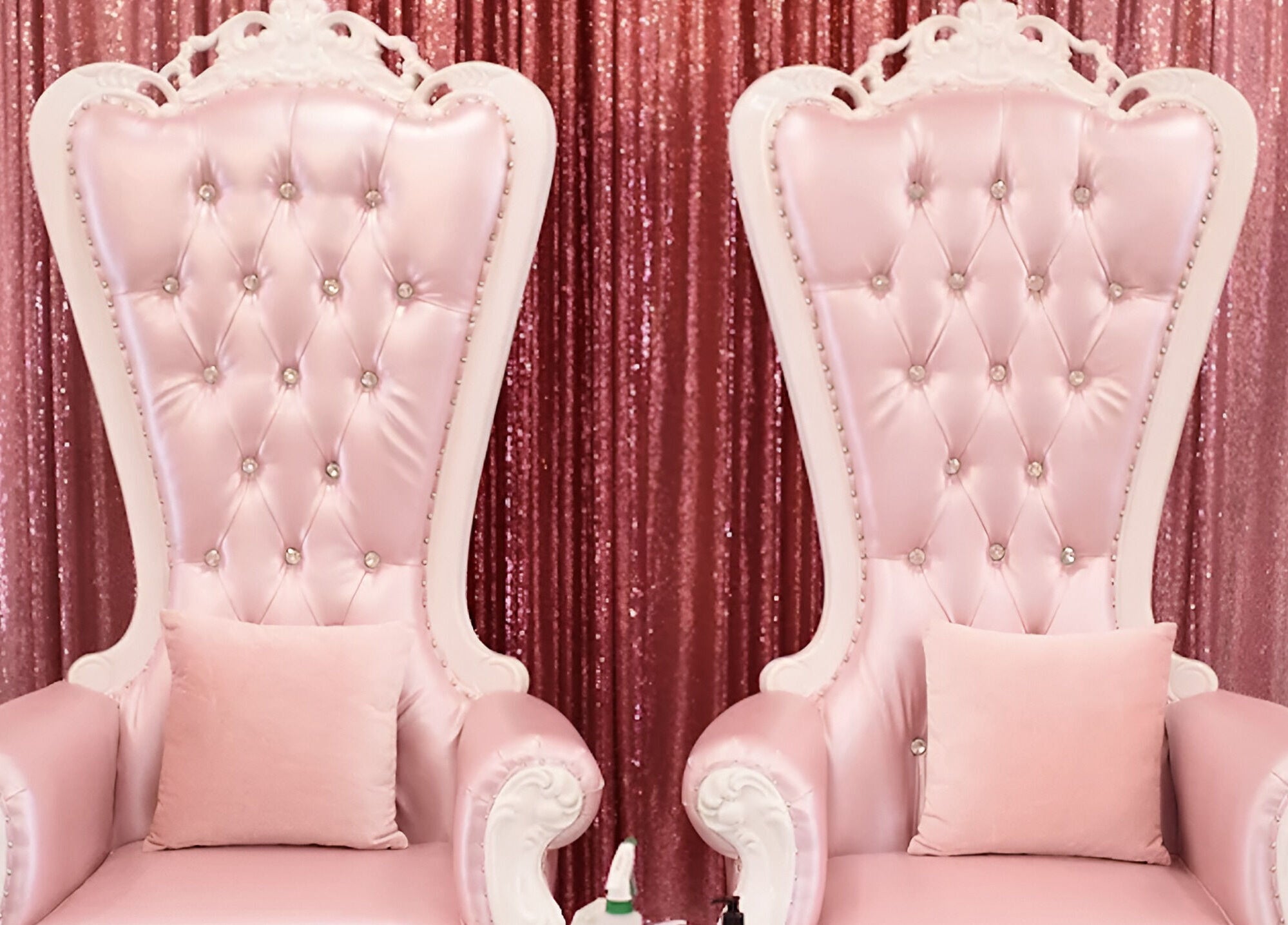 Elegant pink throne chairs at Sugar and Spice Kids Spa and Party, Hamilton, Ontario, CA, perfect for glamorous events.