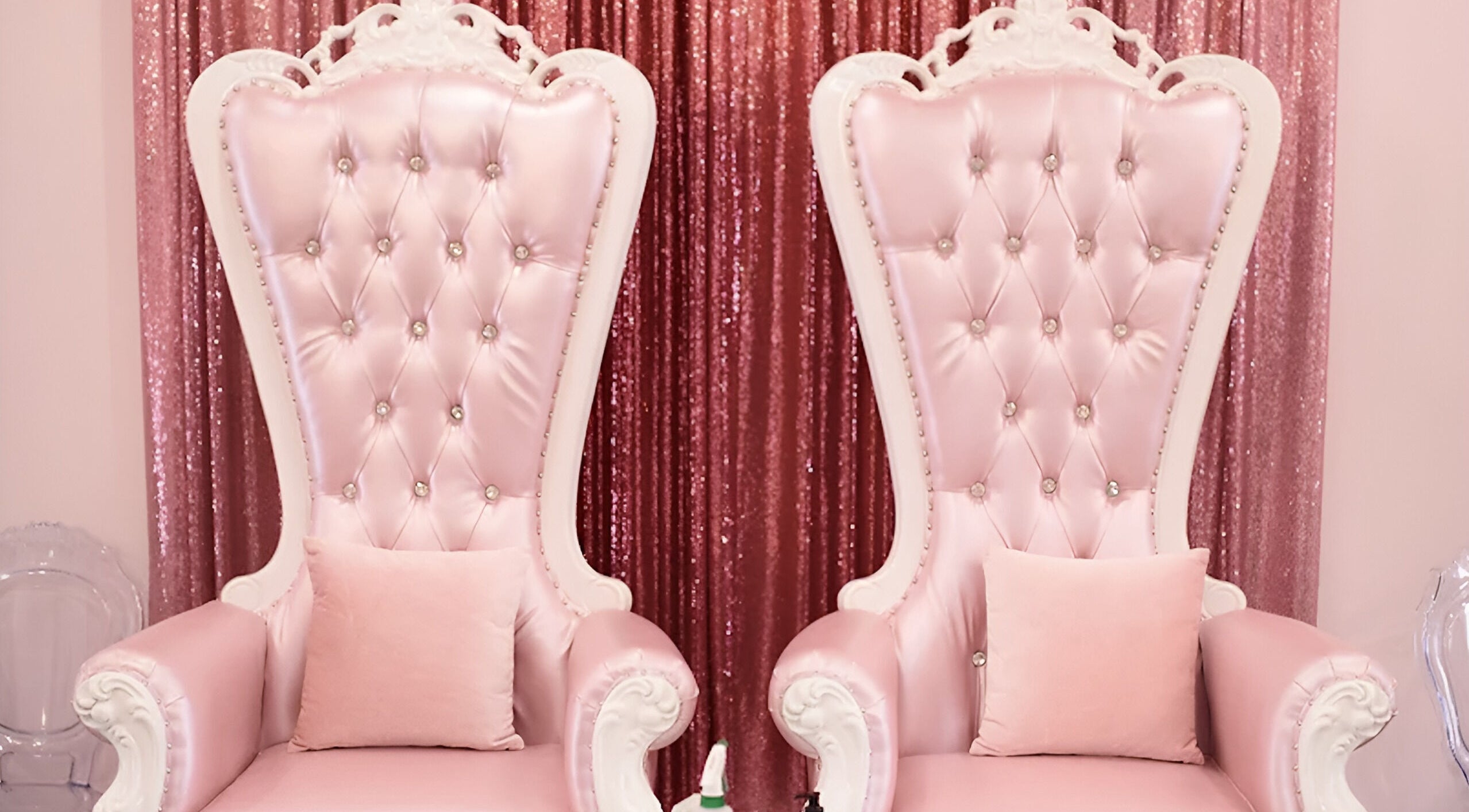Elegant pink throne chairs at Sugar and Spice Kids Spa and Party, Hamilton, Ontario, CA, perfect for glamorous events.