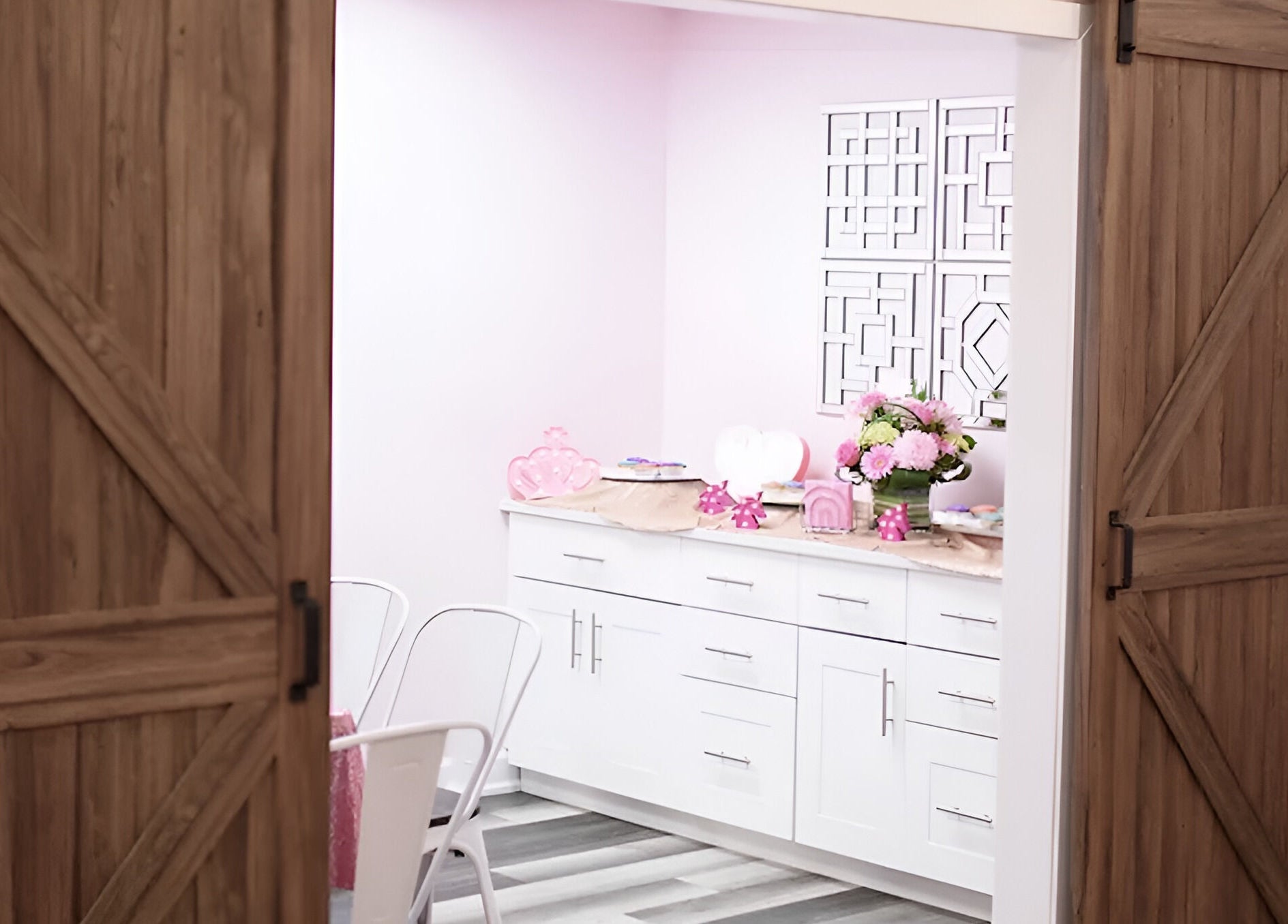 Charming interior of Sugar and Spice Kids Spa and Party, Hamilton, Ontario, CA with soft decor and barn doors.