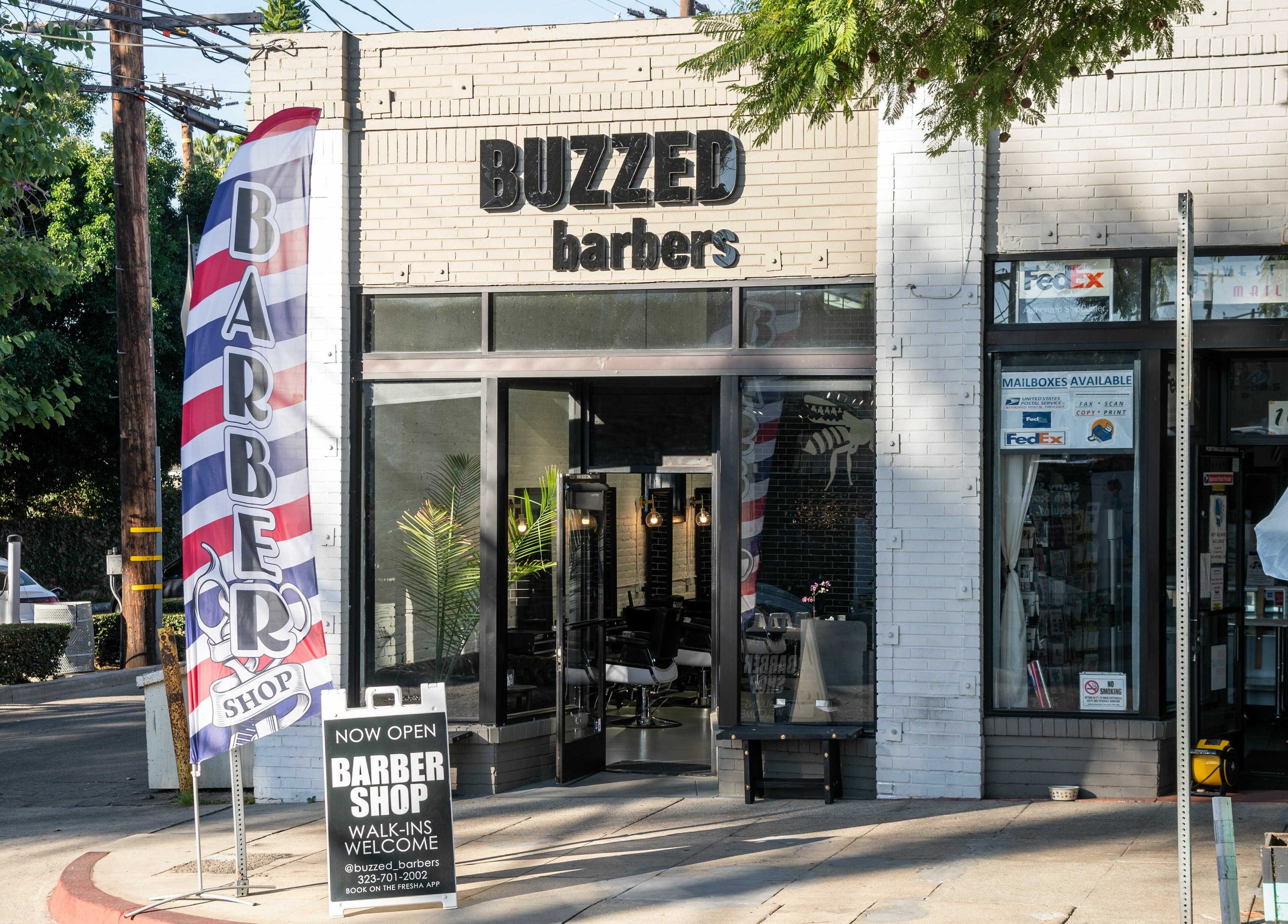 Exterior of Buzzed Barbers West Hollywood, welcoming patrons in West Hollywood, California, US.