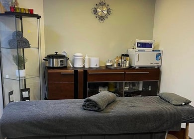 Bk's Beauty spa room with massage table in Milton Damerel, England, GB.