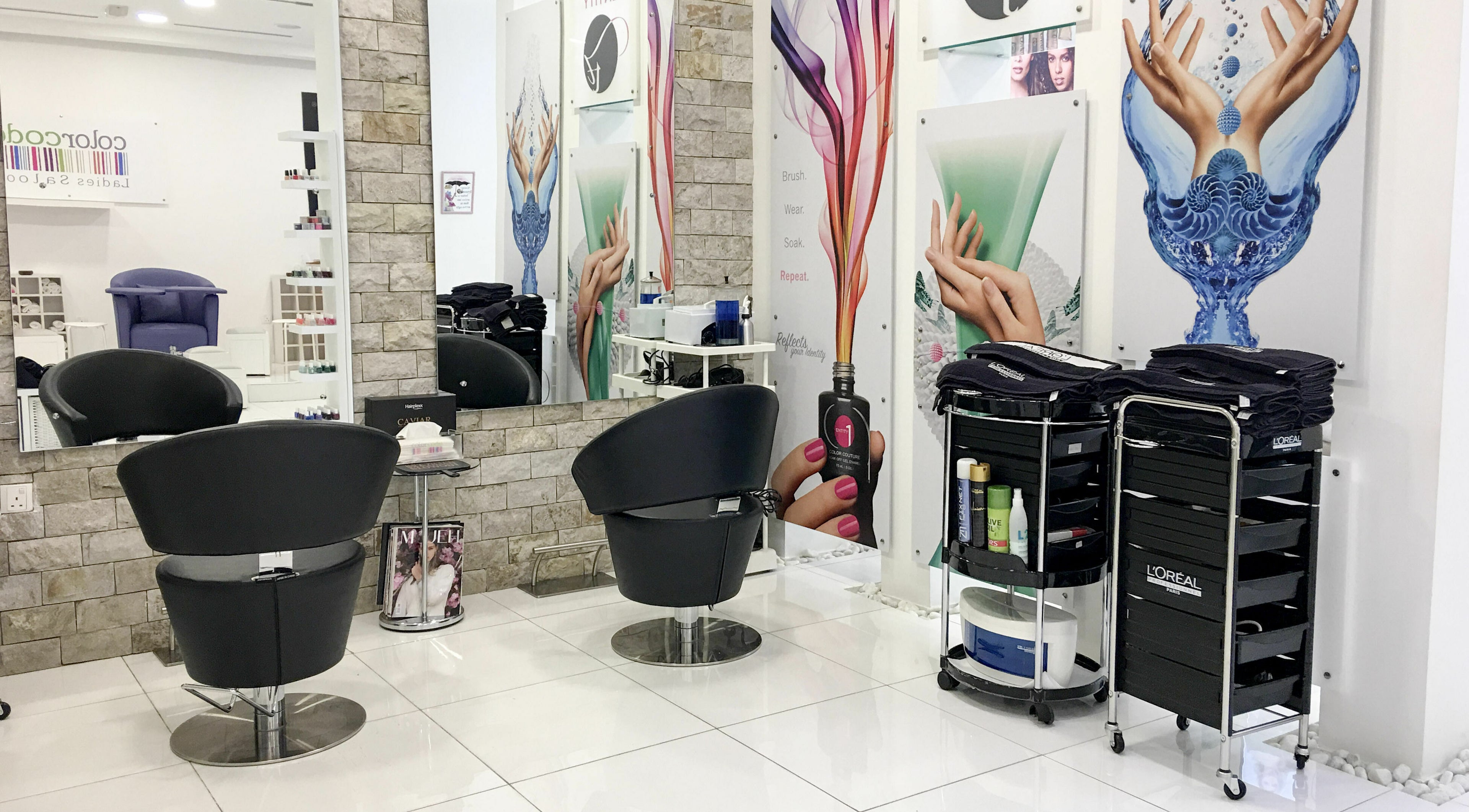 Modern salon interior at Colorcode Emirates Garden 2 Jumeirah Village Circle, Dubai, Dubai, AE with stylish seating.