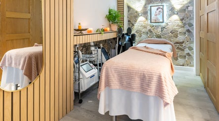 Serene treatment room at Trends Aesthetic Beauty Salon in London, England, GB. Cozy spa ambiance with modern equipment.