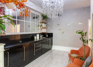 Elegant lounge area at Trends Aesthetic Beauty Salon, London, England, GB, featuring stylish decor and seating.