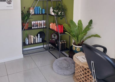 Trendy hair product display at Hair By Amanda in Sandton, Gauteng, ZA, showcasing salon professionalism.