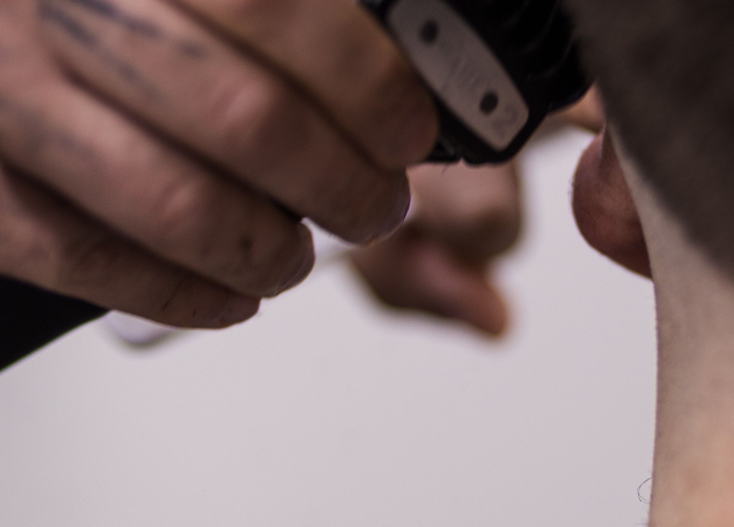 Close-up of hair clipper in action at The Gentlemen’s Lounge Biggleswade, Biggleswade, England, GB.