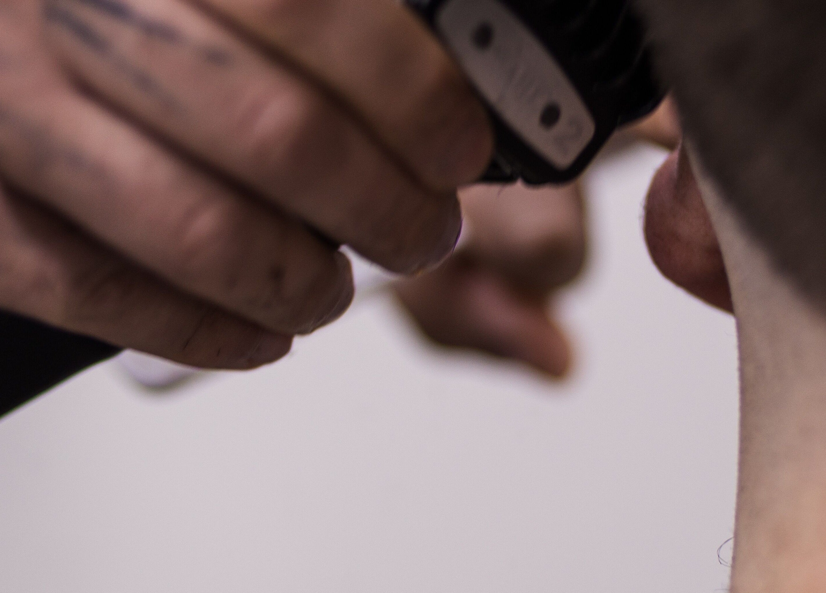 Close-up of hair clipper in action at The Gentlemen’s Lounge Biggleswade, Biggleswade, England, GB.