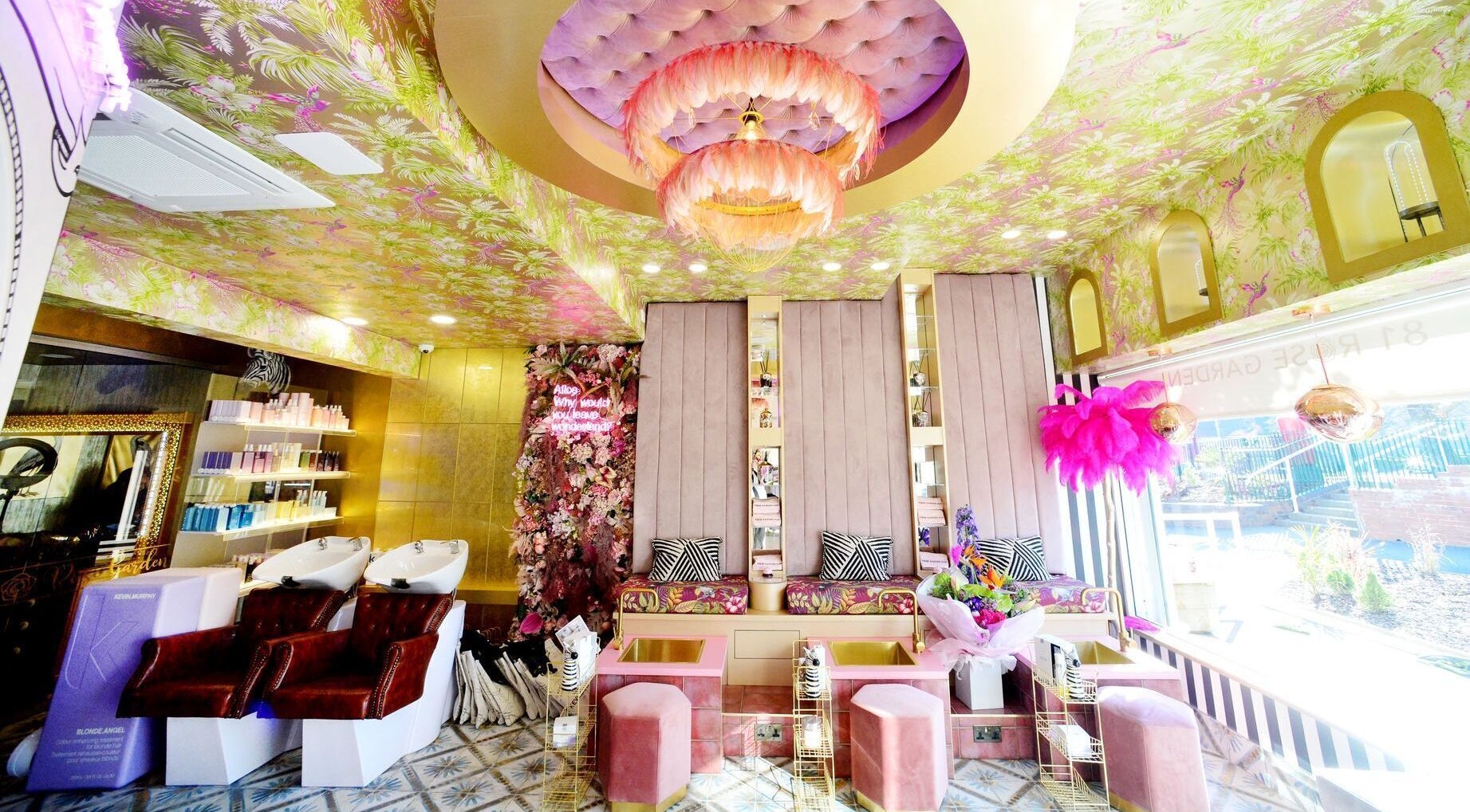 Luxurious interior of 81 Rose Garden, Newcastle-under-Lyme, England with vibrant decor and seating.