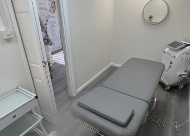 Modern treatment room at Salon Angels Beauty & Aesthetics, Caerphilly, Wales, GB, featuring sleek design and equipment.
