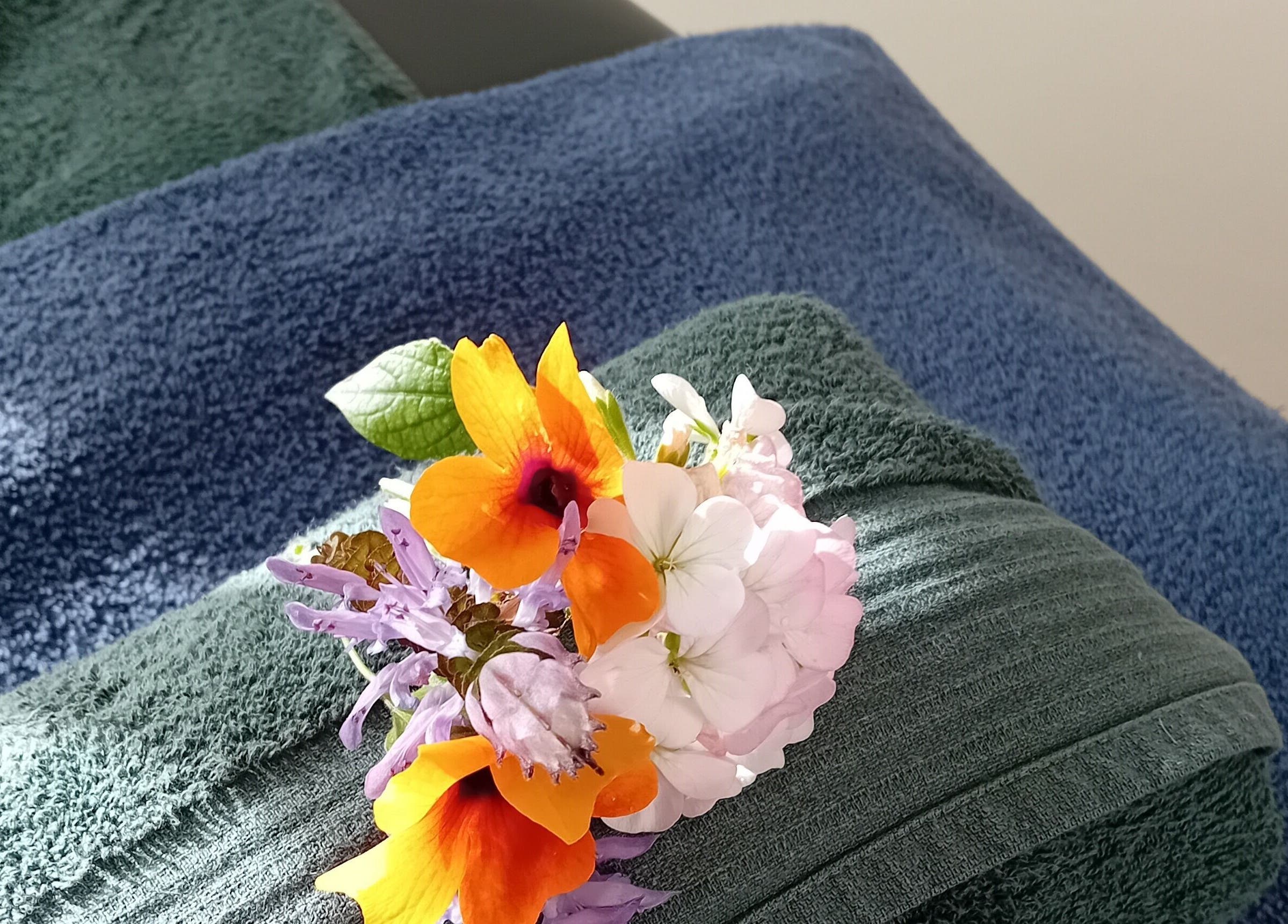 Colorful flowers on soft massage towels at Functional Movement, Hermanus, Western Cape, ZA.