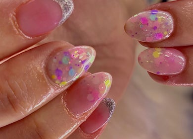 Colorful sparkly manicure at Cherry Blossom Beauty, Thornaby, England, GB.