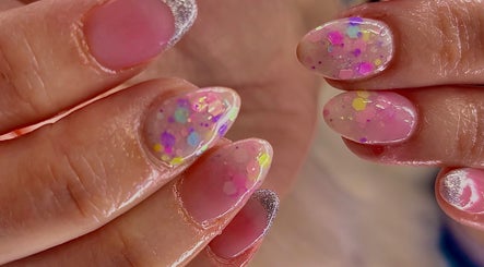 Colorful sparkly manicure at Cherry Blossom Beauty, Thornaby, England, GB.