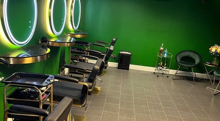 Elegant hair styling area at Halo Hair Salon, Malton, England, GB, with modern décor and sleek chairs.
