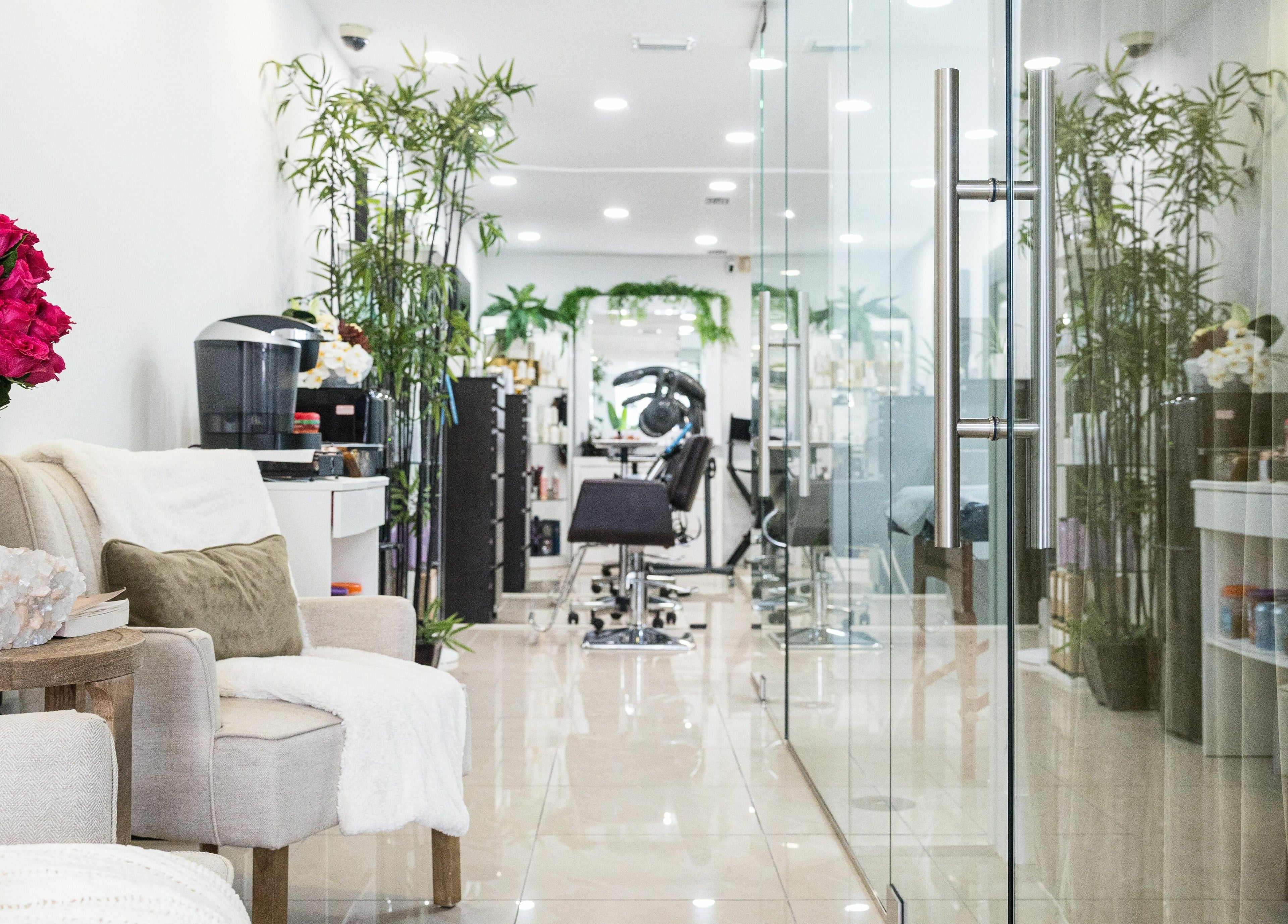 Relaxing seating area at BG Integrative Studio, Coral Gables, Florida, US with plush chairs and vibrant decor.