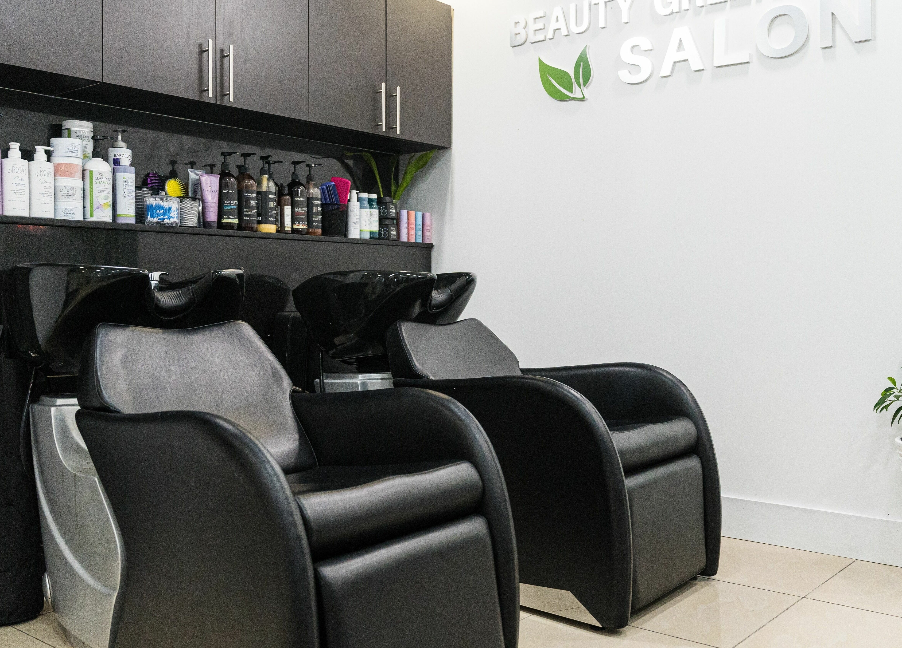 Hair wash stations at BG Integrative Studio, Coral Gables, Florida, US, showcasing sleek design and products.