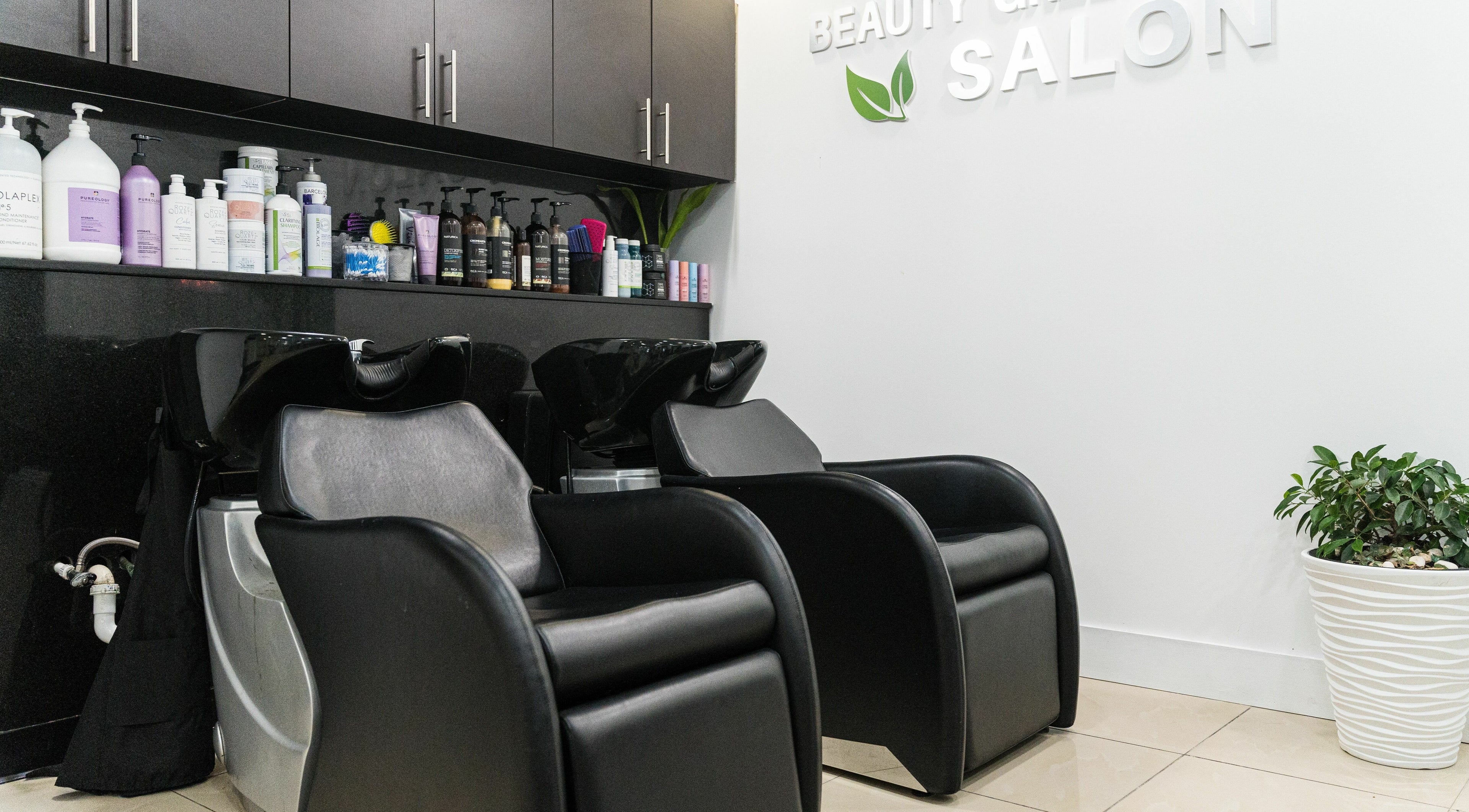 Hair wash stations at BG Integrative Studio, Coral Gables, Florida, US, showcasing sleek design and products.