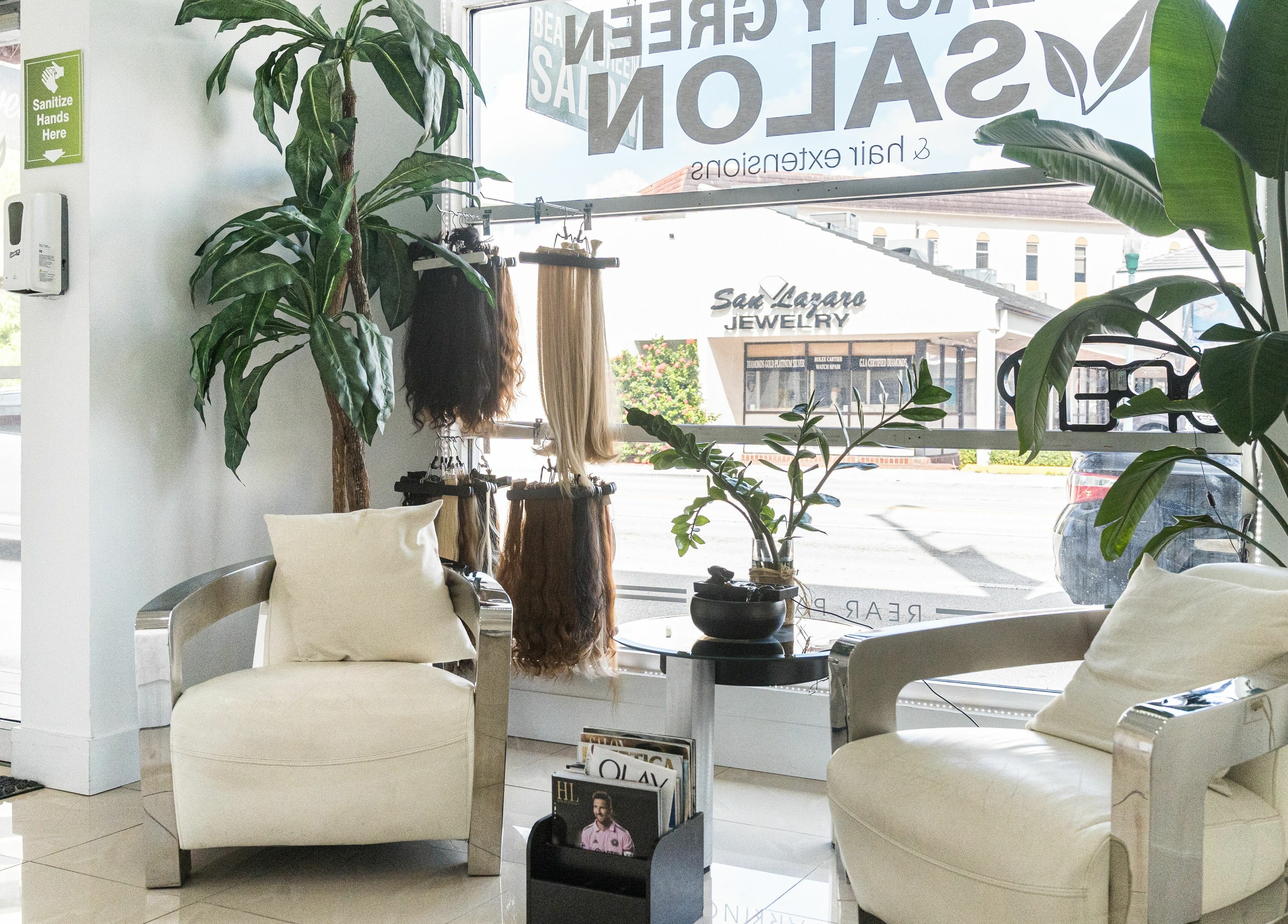 Stylish seating area at BG Integrative Studio in Coral Gables, Florida, US, with lush plants and natural light.