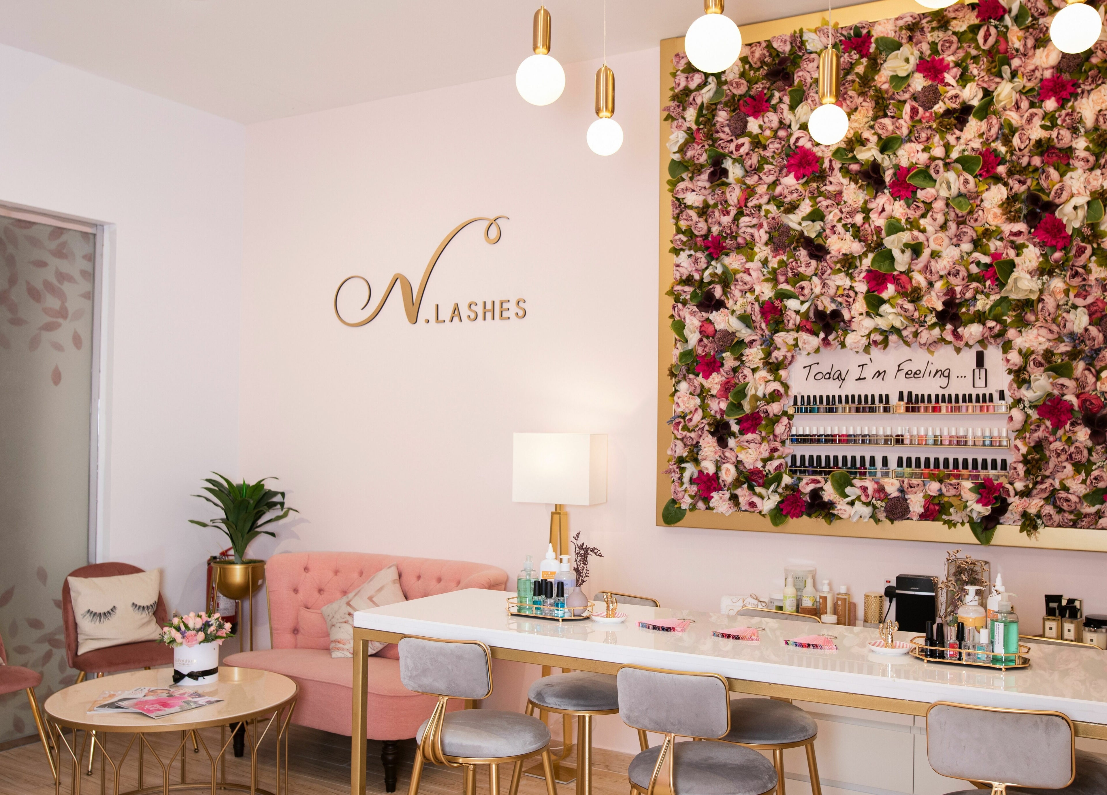 Elegant interior of N.Lashes Al Khobar, with floral decor and stylish seating in Al Khobar, Eastern Province, SA.