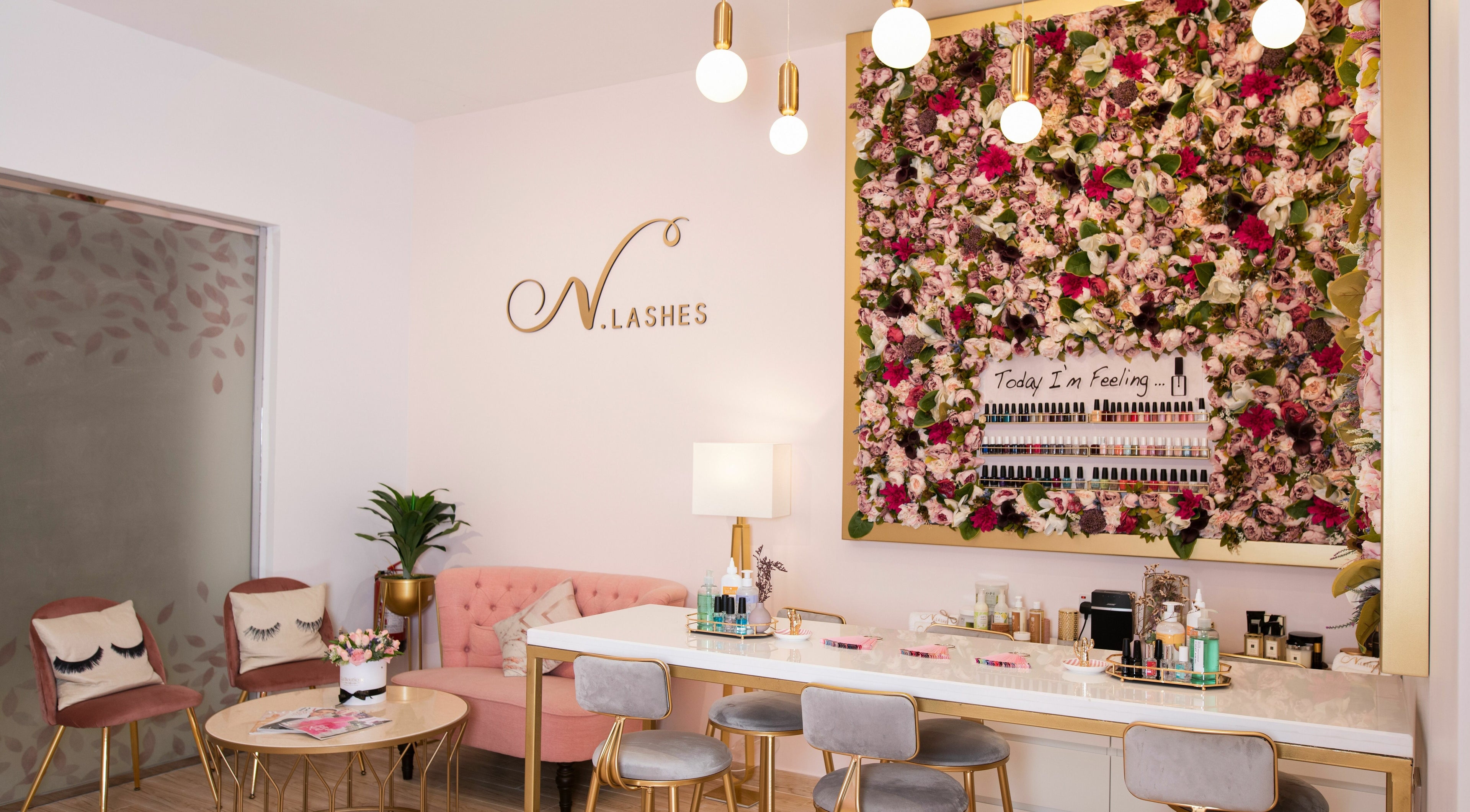 Elegant interior of N.Lashes Al Khobar, with floral decor and stylish seating in Al Khobar, Eastern Province, SA.