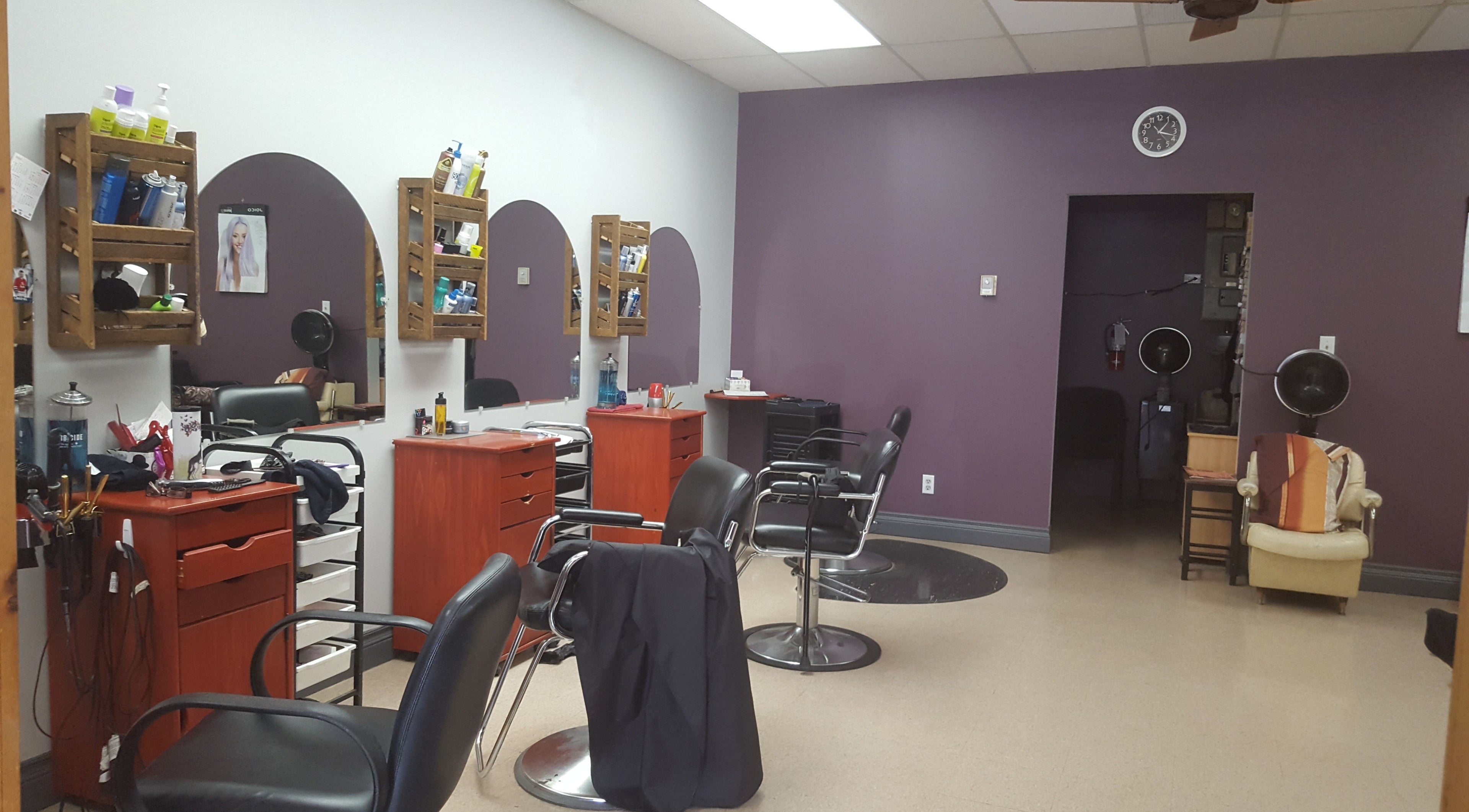 Relaxing salon chairs in Orillia Hair, Orillia, Ontario, CA, with a modern, welcoming design.