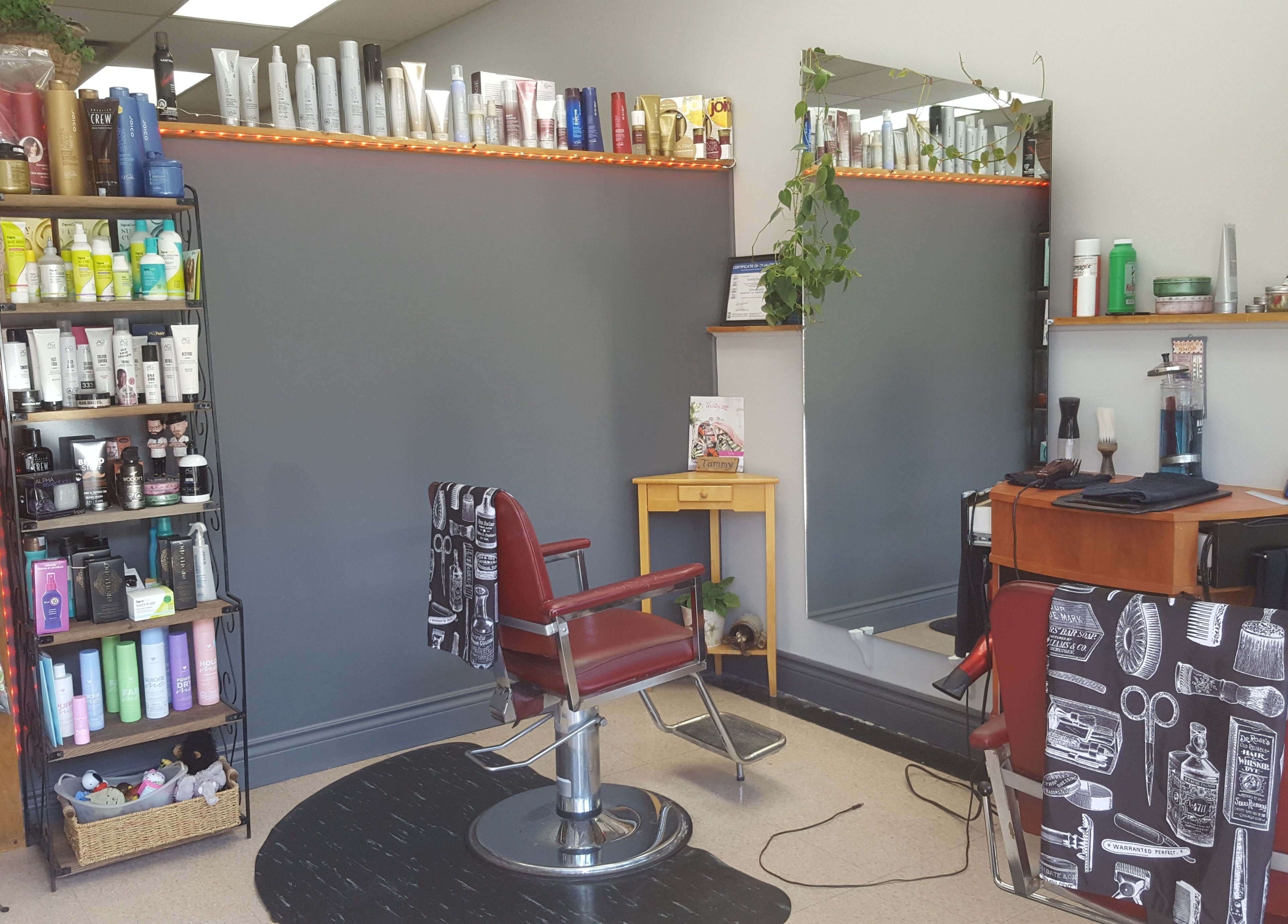 Orillia Hair's stylish salon chair and product display in Orillia, Ontario, CA.