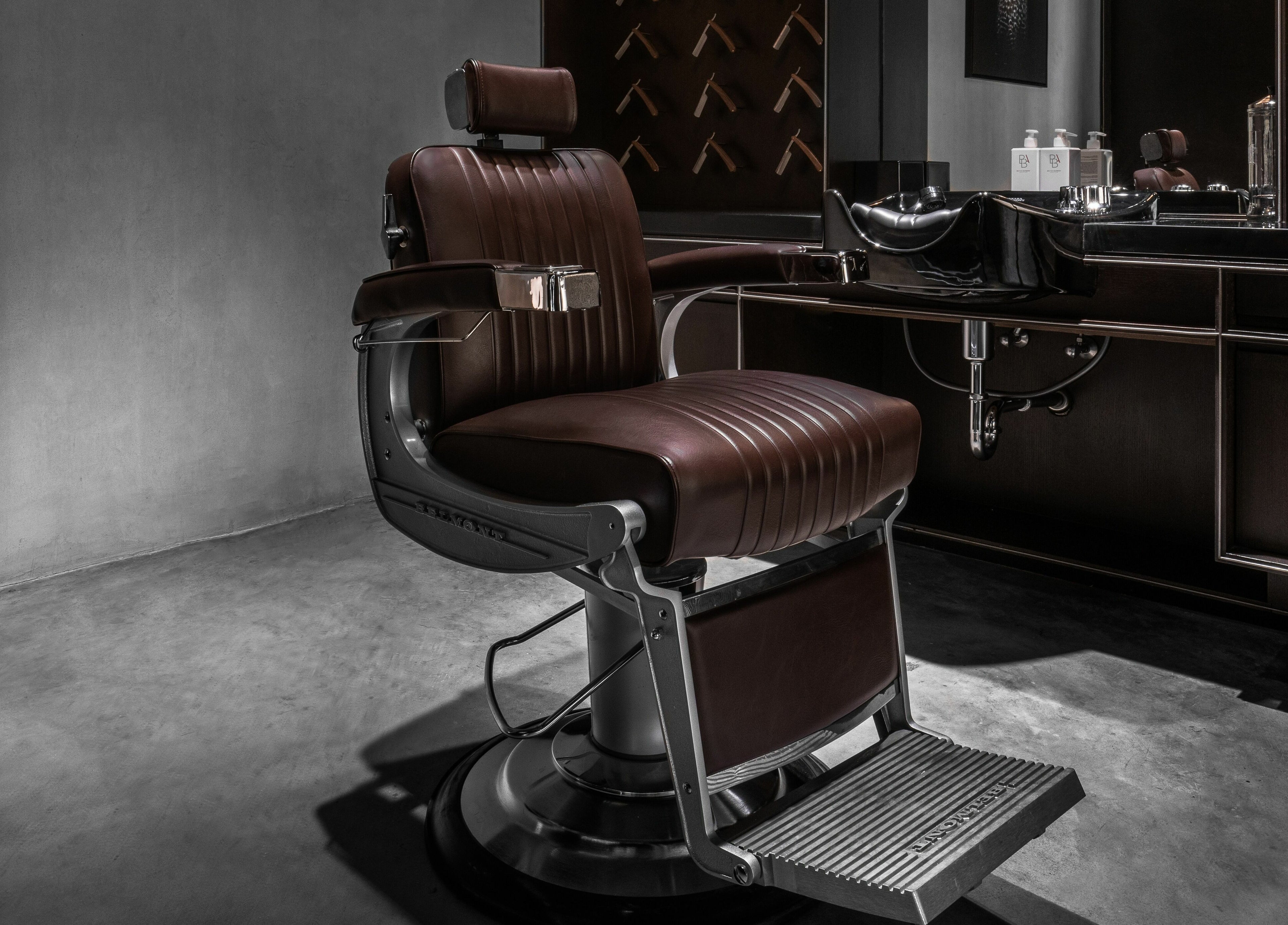 Elegant barber chair at Chaps & Co - Nojoud Mall, Riyadh, Riyadh Province, SA, highlighting luxury grooming.
