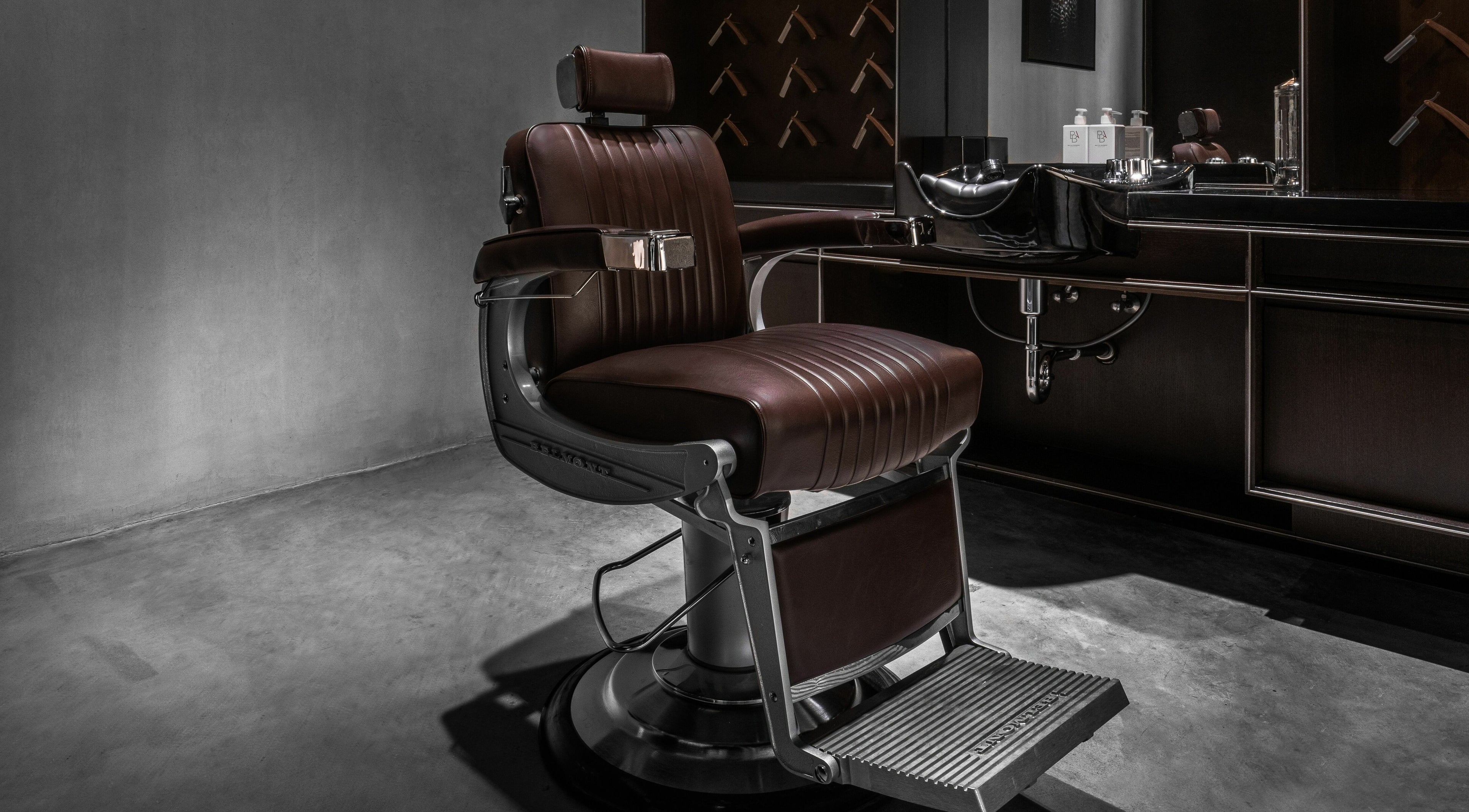 Elegant barber chair at Chaps & Co - Nojoud Mall, Riyadh, Riyadh Province, SA, highlighting luxury grooming.