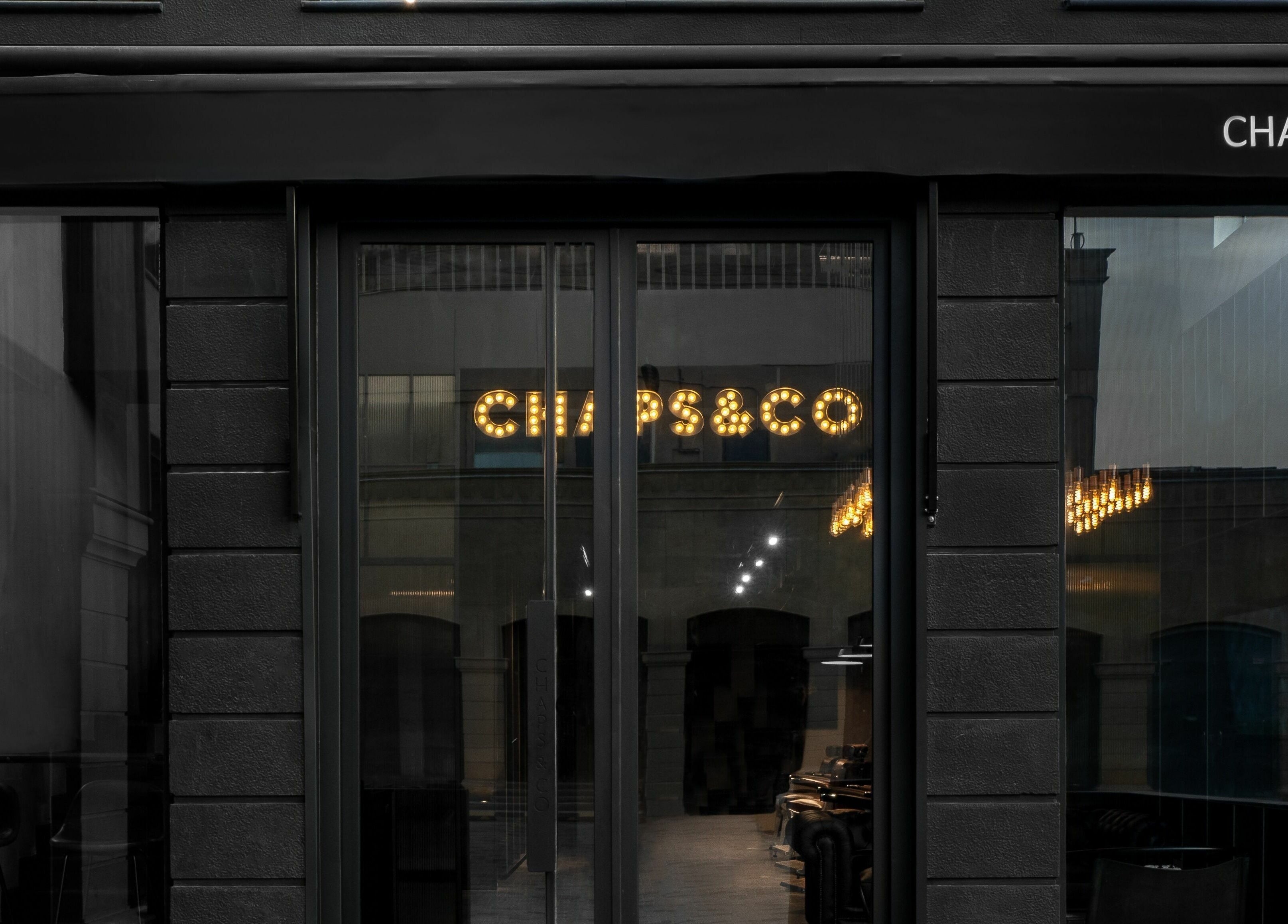 Sophisticated exterior of Chaps & Co - Nojoud Mall in Riyadh, reflecting stylish ambiance and modern design.