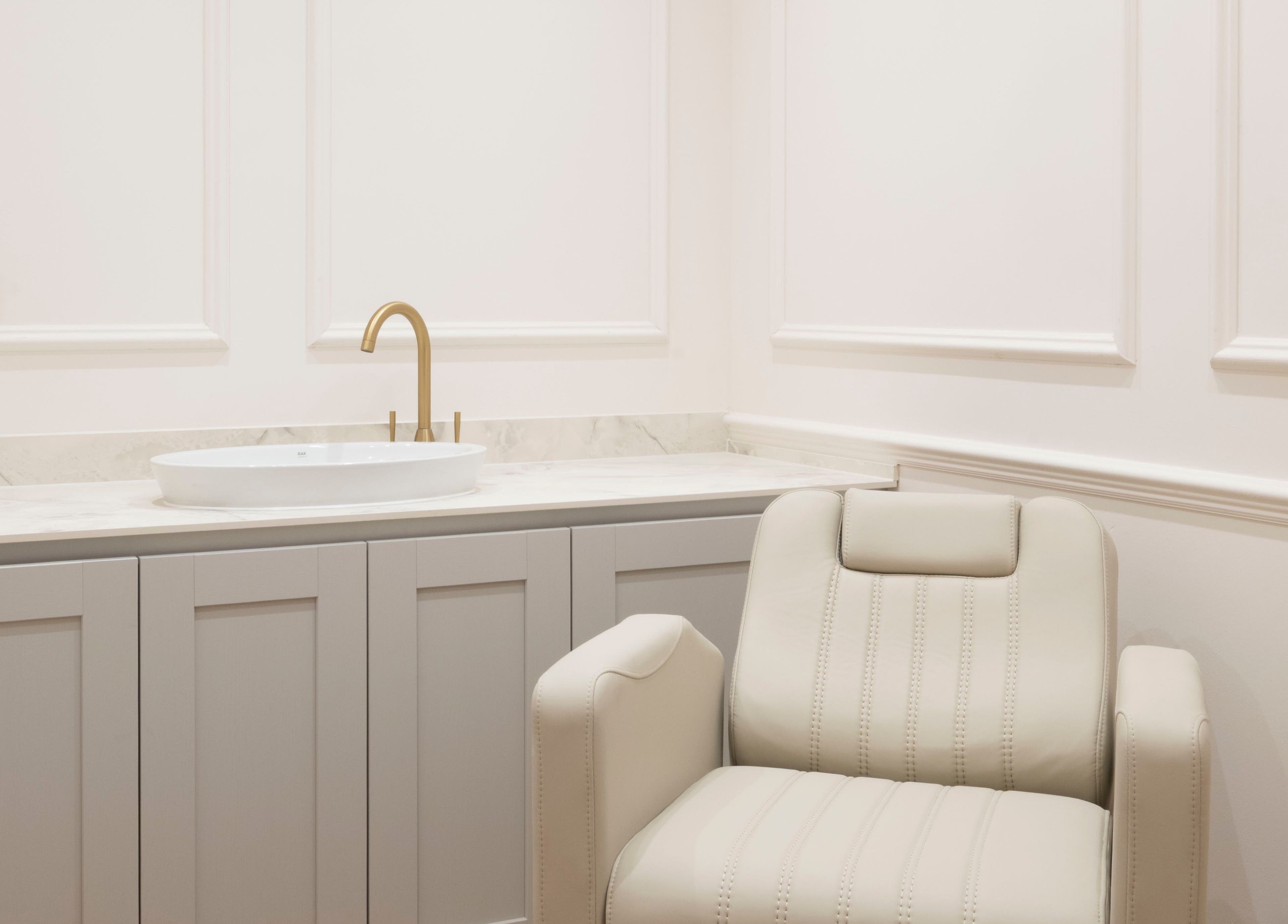 Luxurious chair and sink in Harlowes & Sophie Rae Medical, Sandwich, England for a tranquil spa experience.