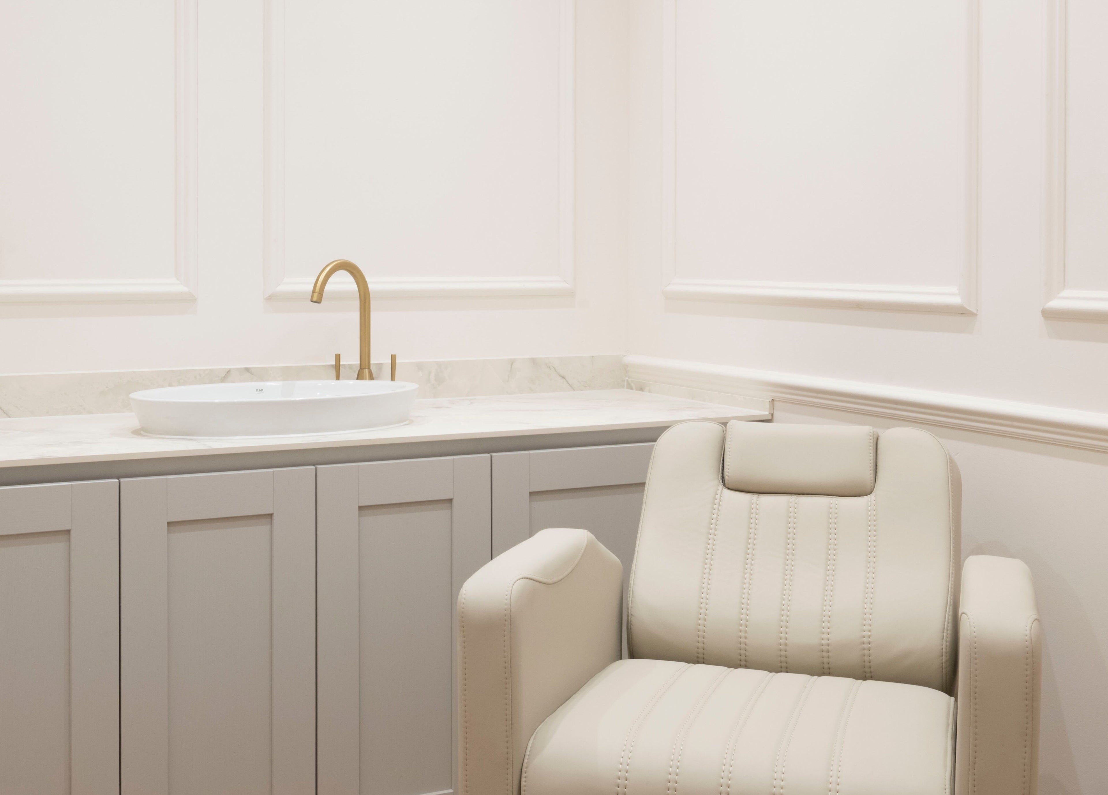 Luxurious chair and sink in Harlowes & Sophie Rae Medical, Sandwich, England for a tranquil spa experience.