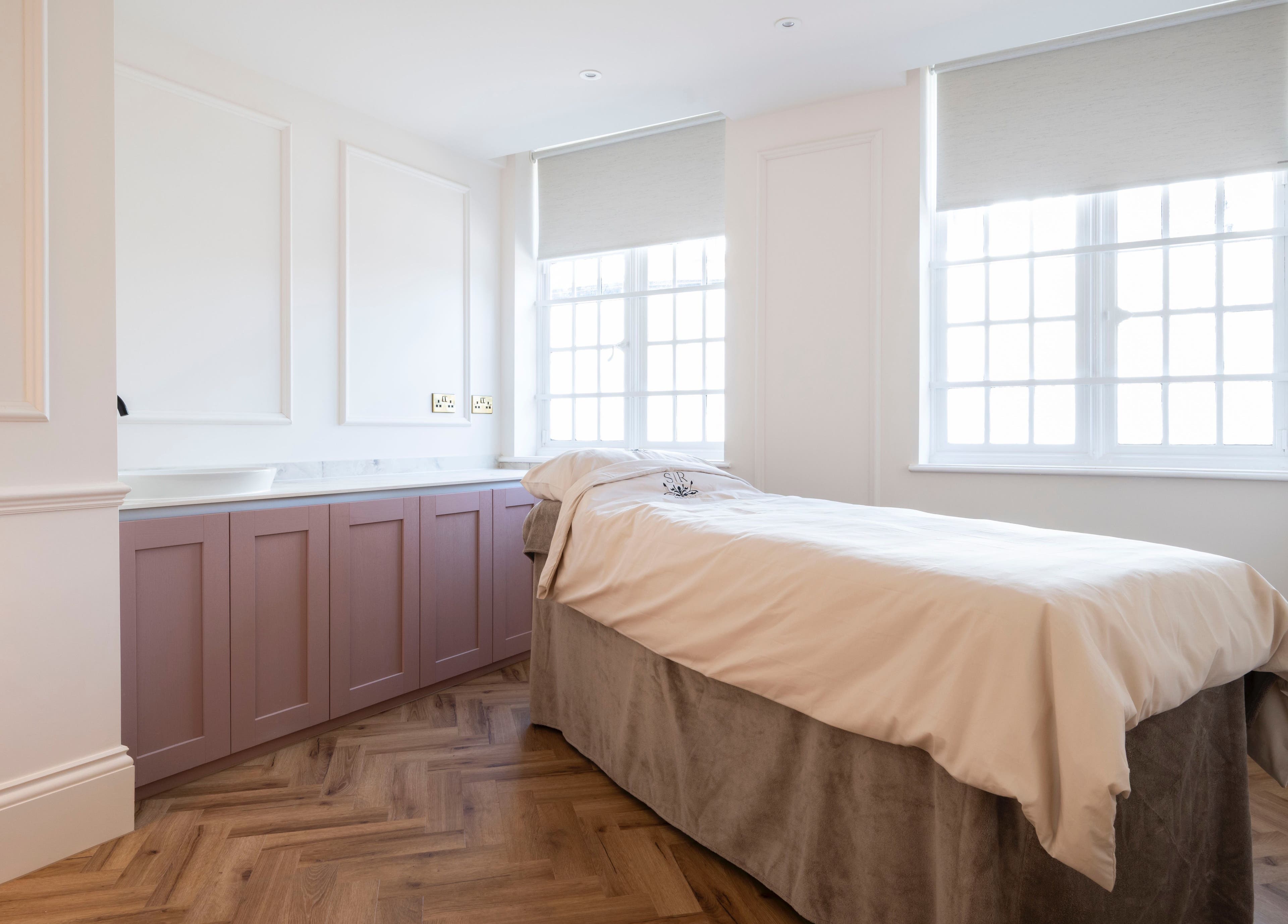 Relaxing treatment room at Harlowes & Sophie Rae Medical, Sandwich, England for wellness retreats.