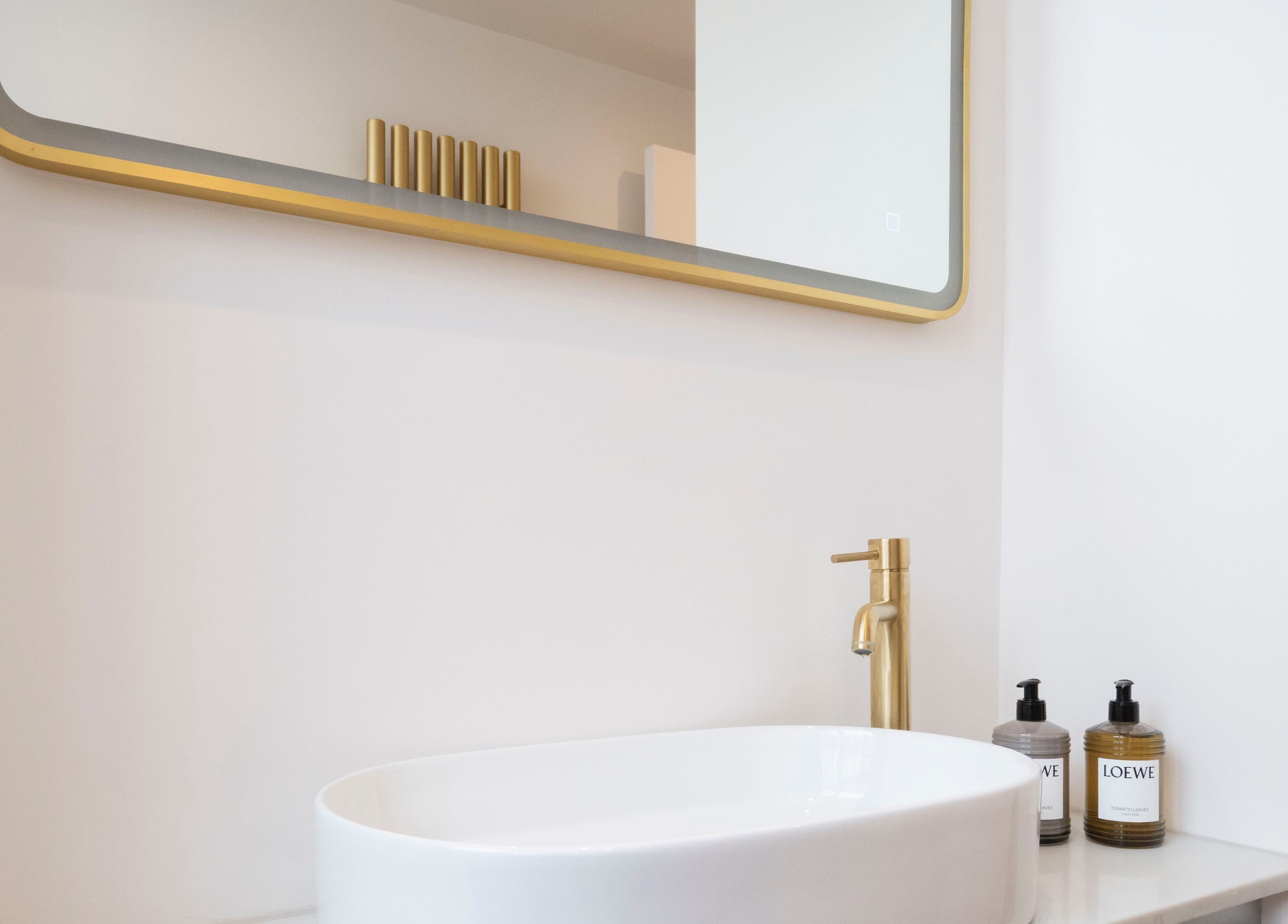 Luxurious sink with gold faucet at Harlowes & Sophie Rae Medical, Sandwich, England, GB.