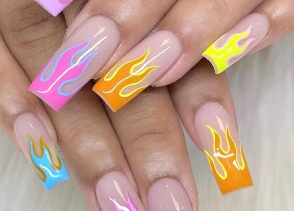 Vibrant flame nail art at Glamor Nails, Bound Brook, New Jersey, US.