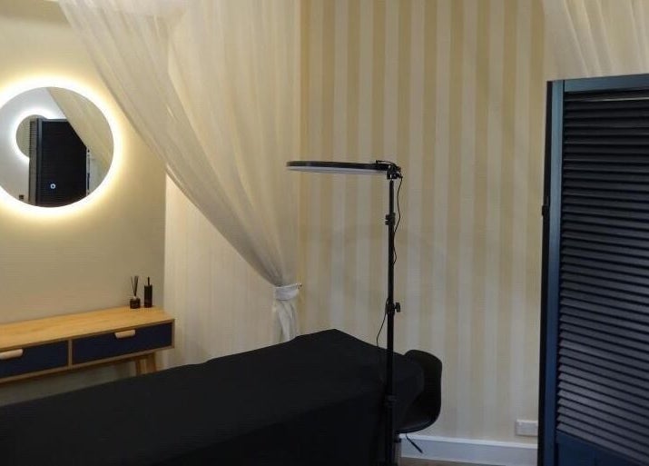 Elegant treatment room at Passion Lash and Brow, Mount Hawthorn, Western Australia, AU, featuring a stylish mirror.