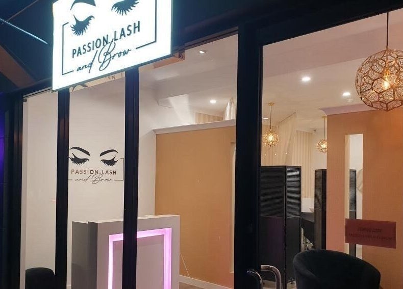 Illuminated entrance of Passion Lash and Brow in Mount Hawthorn, WA, AU, showcasing elegance and style.
